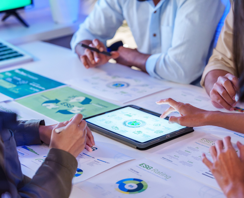 View Of Data On Papers And Tablets In Energy Regulation Meeting